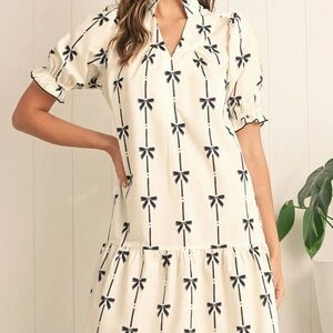 White Dress with Black Bow Pattern